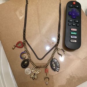 Multiple pendant gold necklace